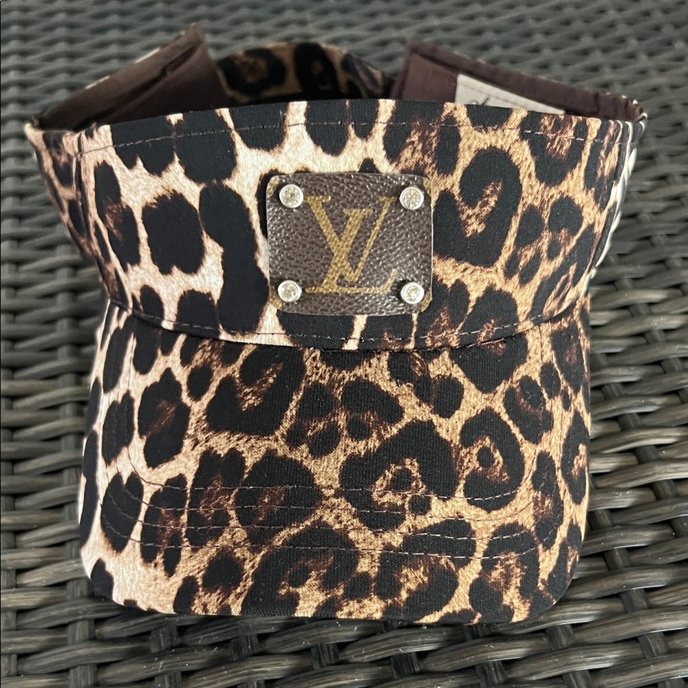 Leopard visor with authentic LV leather patch on front with rhinestones.